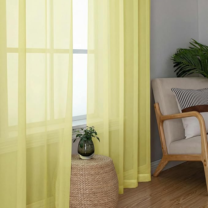 OWENIE Sheer Curtains 63 Inch Length 2 Panels Set for Bedroom Living Room, Modern Soft Solid Light Filtering Sheer Curtain, Rod Pocket Window Treatments, 42" Wx63 L, Light Yellow